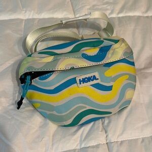 Hoka Blue and Yellow Crossbody Bag with Dynamic Wave Design